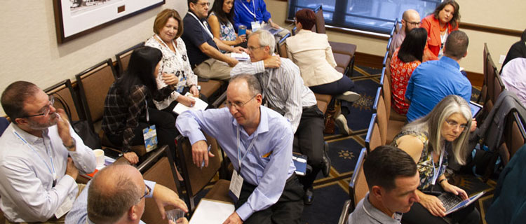 Session attendees participate in a group activity